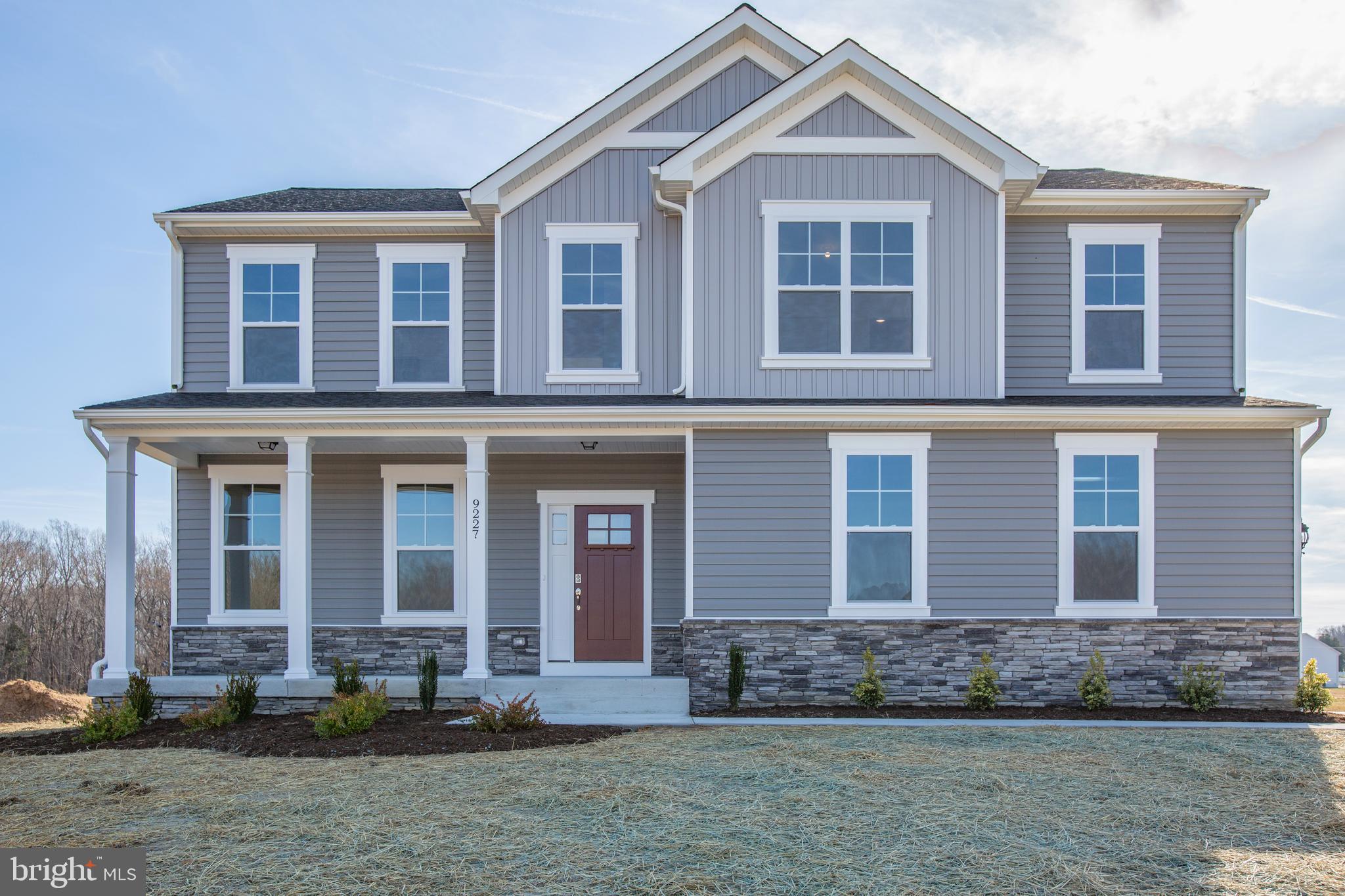 2107 Warrenton Road Fredericksburg, VA 22406 - Photo 50 of 58 a front view of a house with a yard