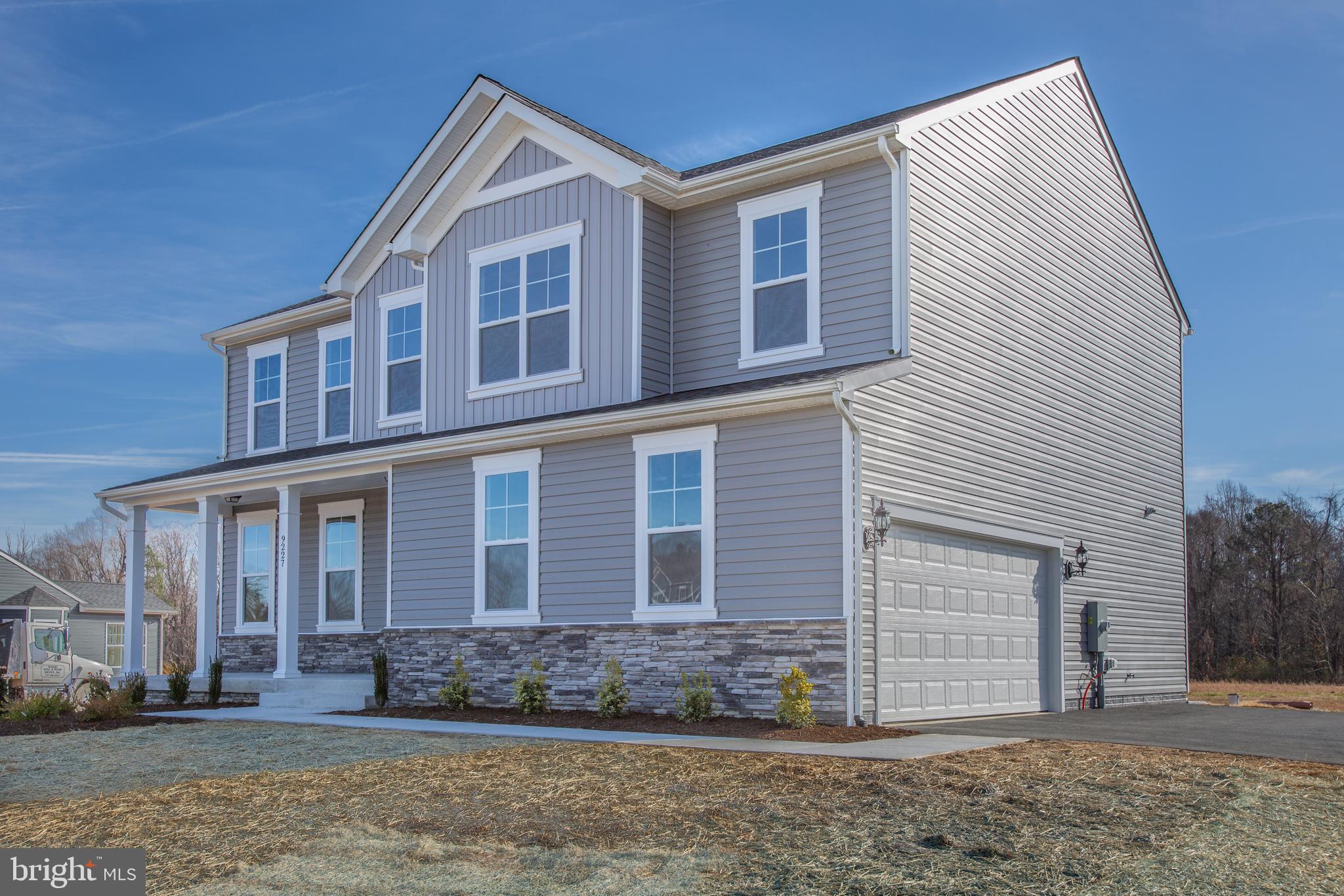 2107 Warrenton Road Fredericksburg, VA 22406 - Photo 56 of 58 a front view of a house with garden