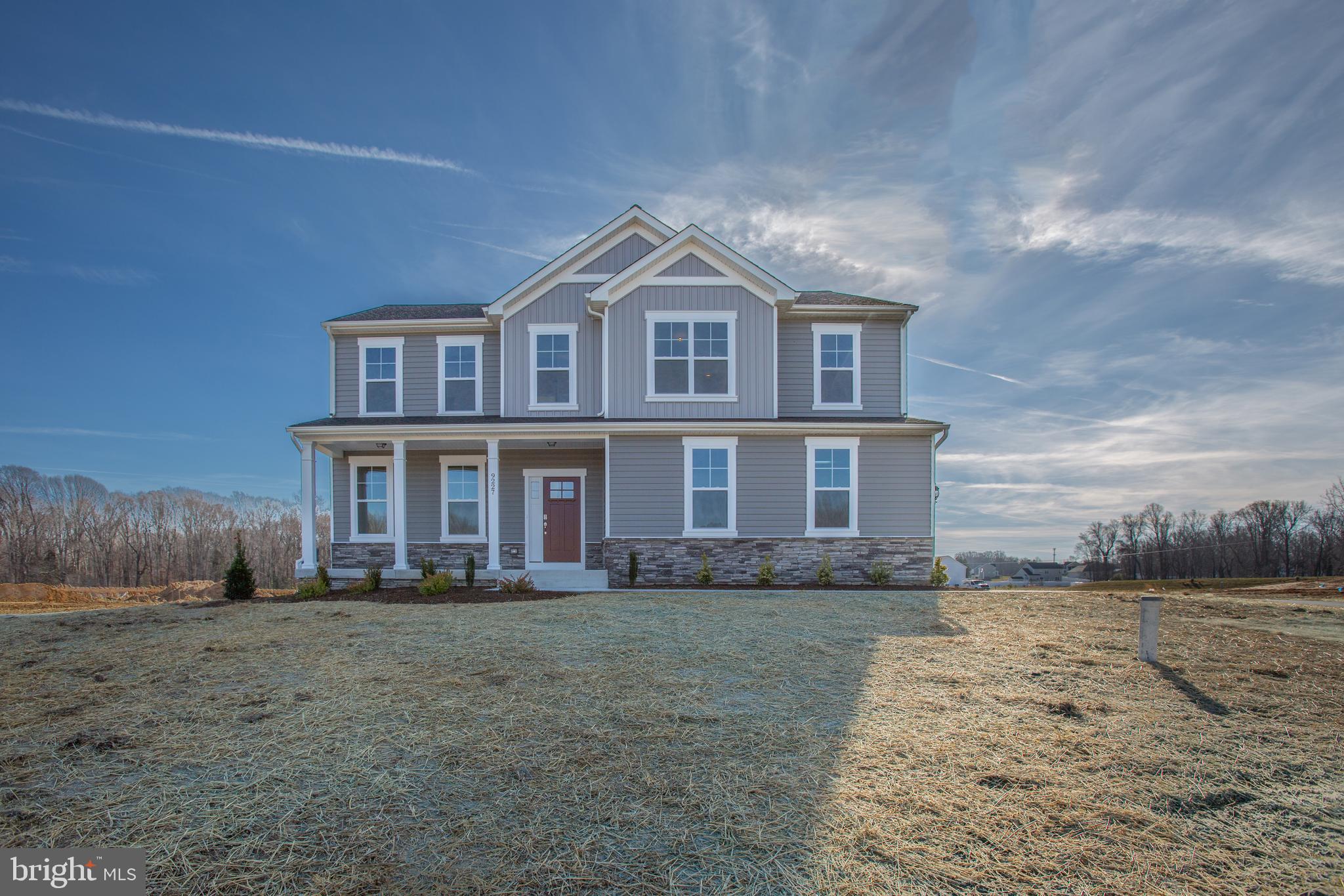 2107 Warrenton Road Fredericksburg, VA 22406 - Photo 57 of 58 a front view of a house with a yard