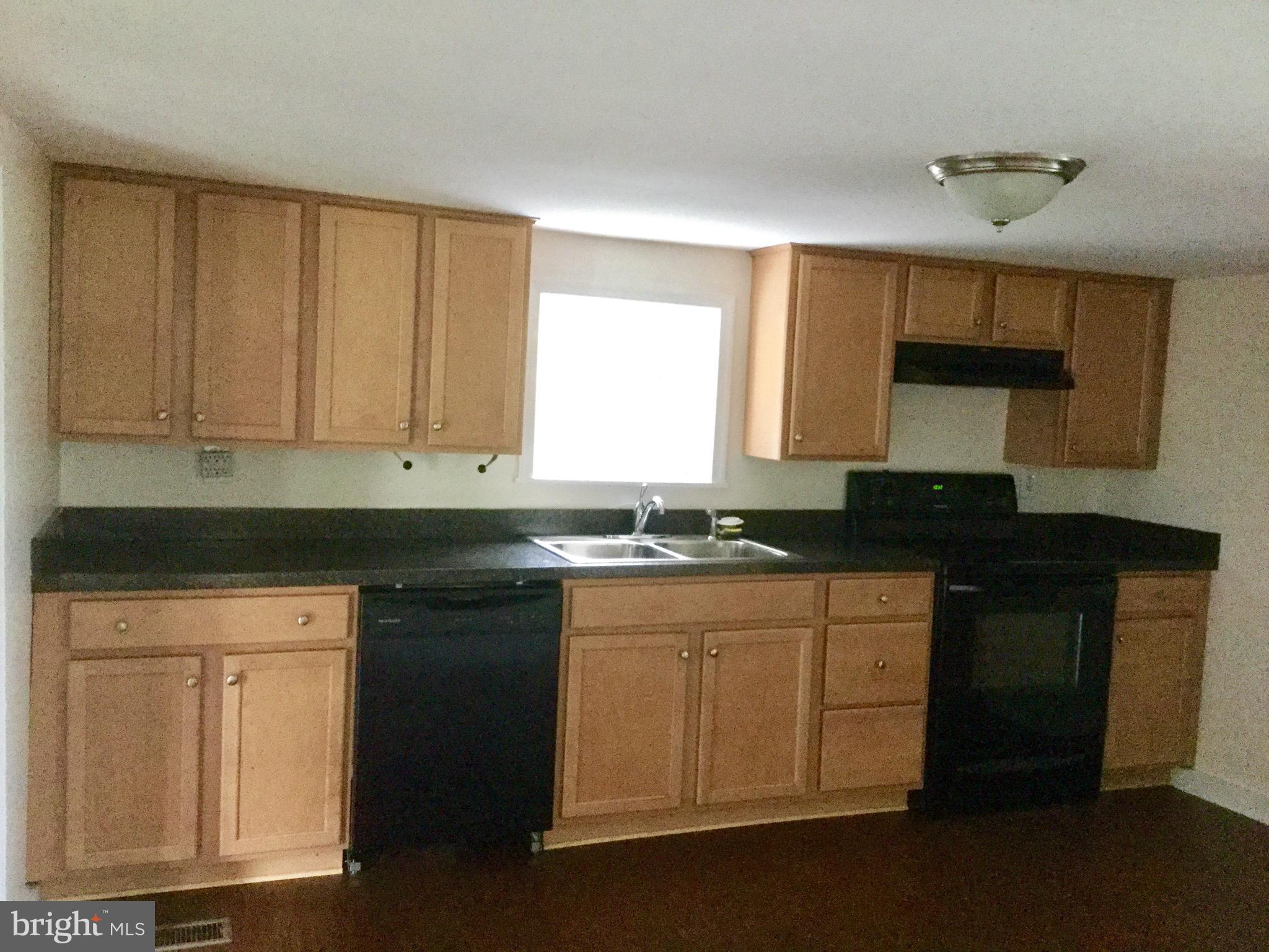 455 Black Rock Road Hanover, PA 17331 - Photo 12 of 48 a kitchen with granite countertop a sink and a stove
