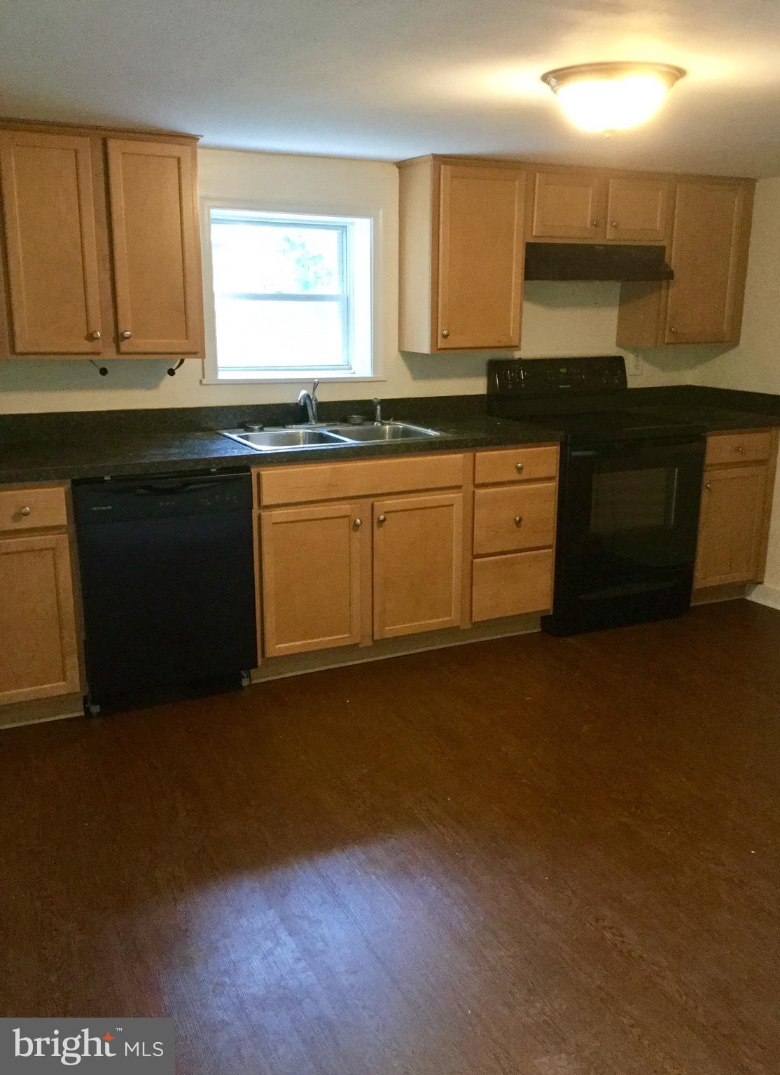 455 Black Rock Road Hanover, PA 17331 - Photo 13 of 48 a kitchen with granite countertop white cabinets and a sink