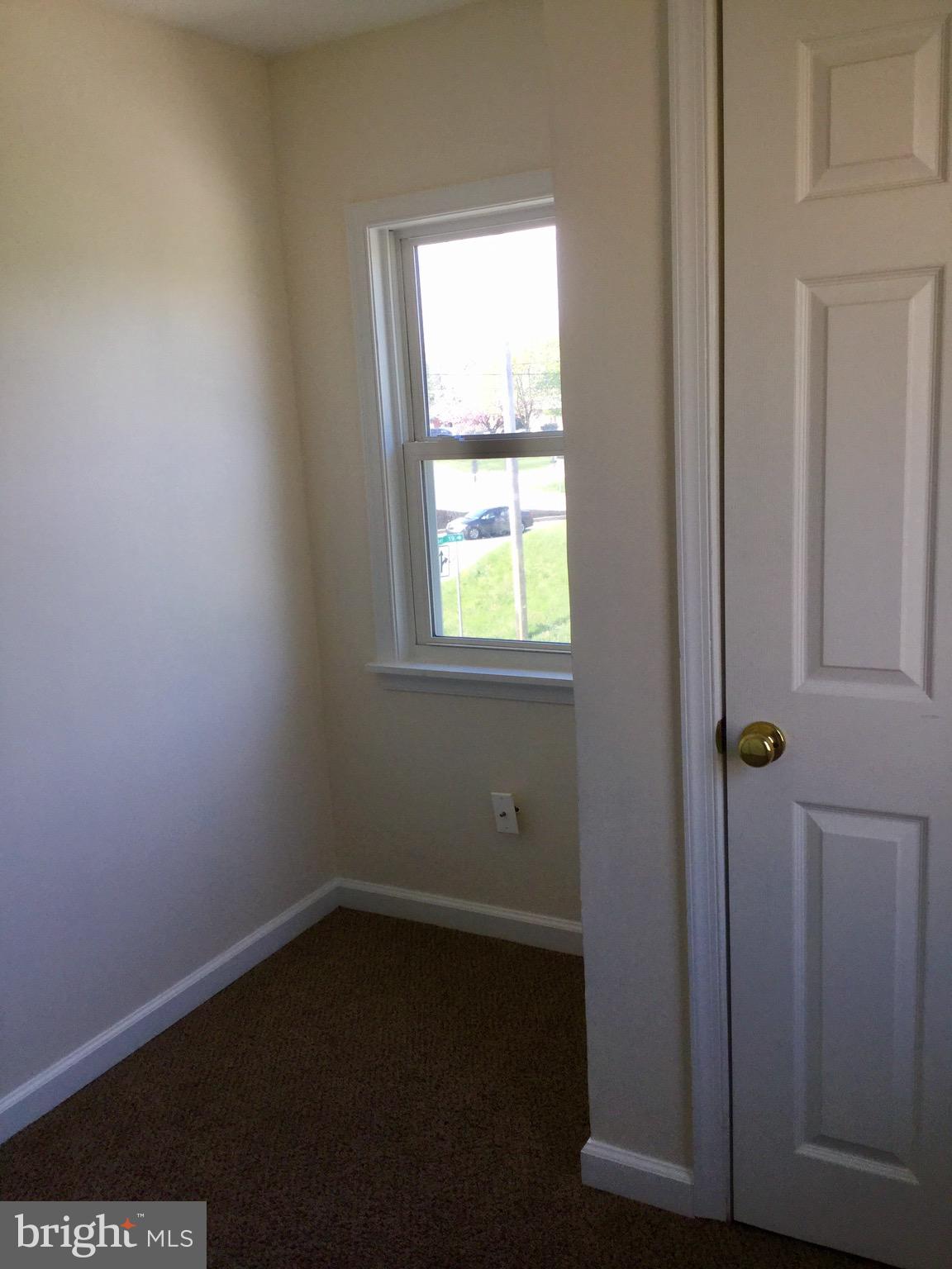455 Black Rock Road Hanover, PA 17331 - Photo 34 of 48 an empty room with wooden floor and windows