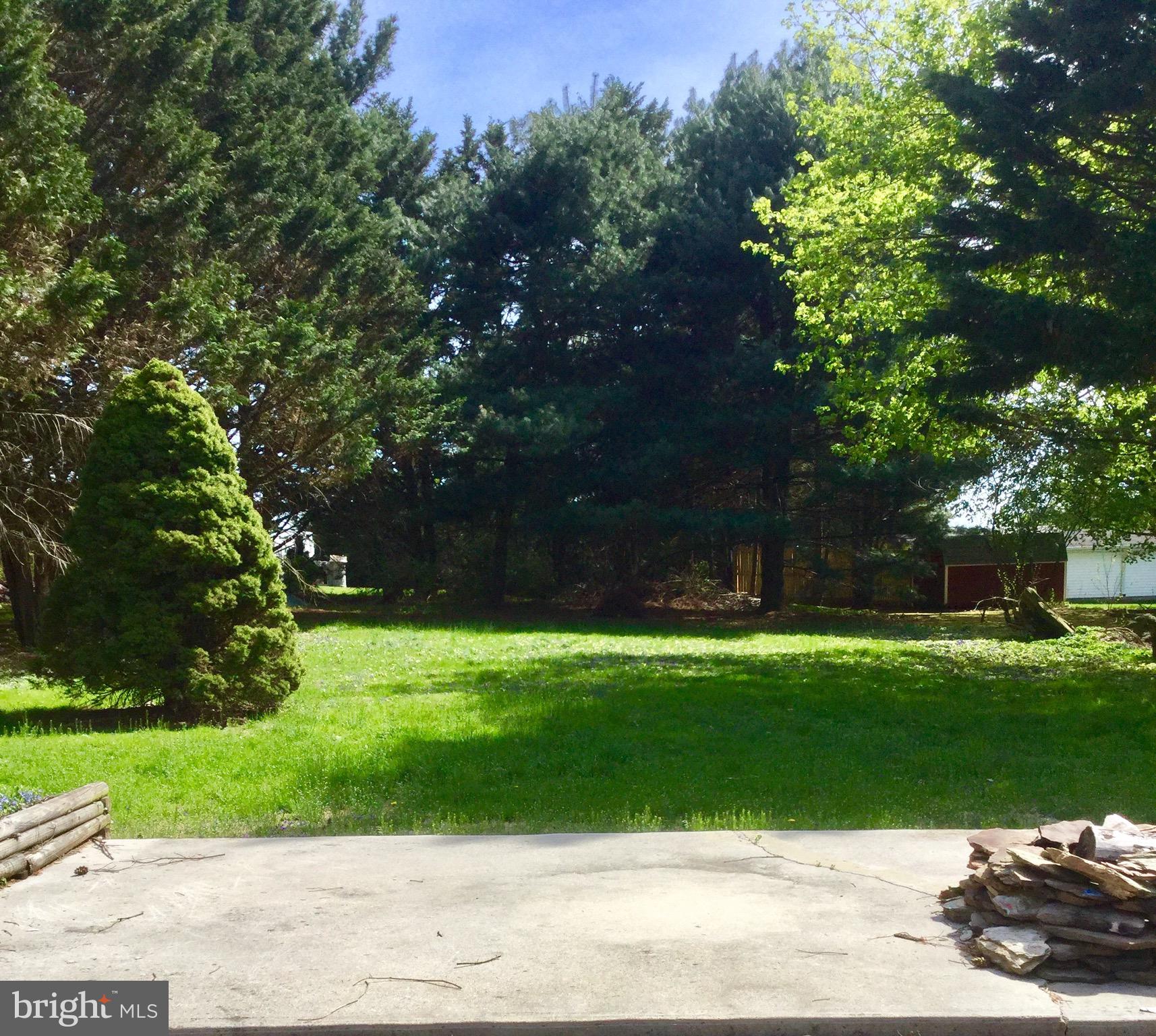 455 Black Rock Road Hanover, PA 17331 - Photo 39 of 48 a backyard of a house with lots of green space and fountain