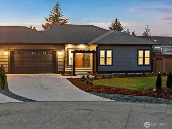 a view of a hallway with a wooden floor