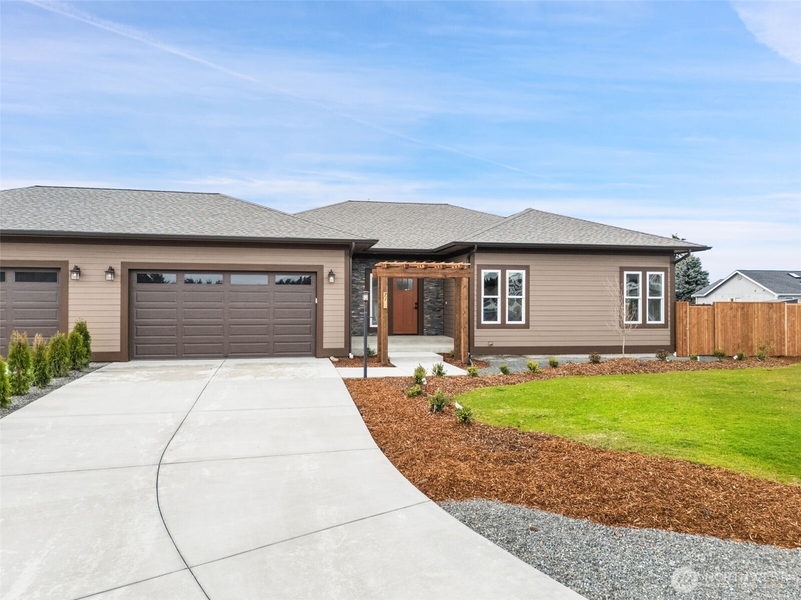 71 Heron Way, Unit A Sequim, WA 98382 - Photo 2 of 38 front view of a house with a yard