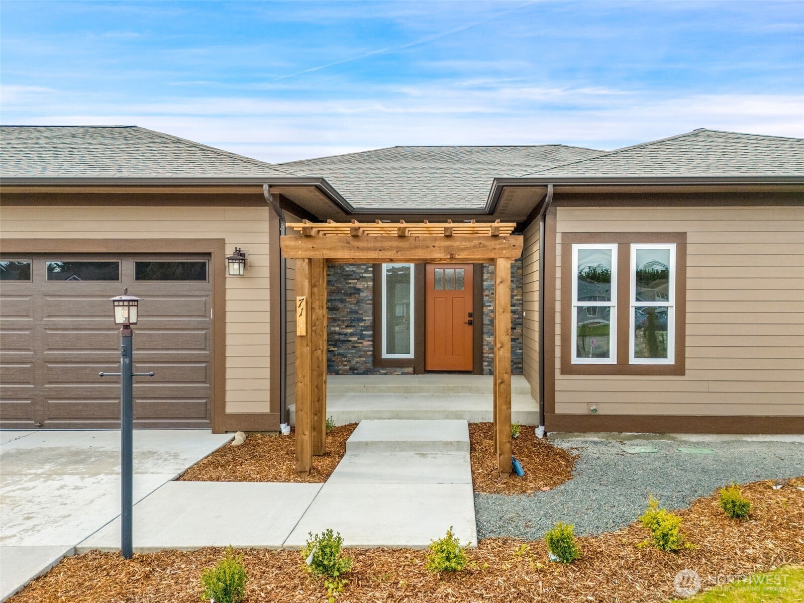 71 Heron Way, Unit A Sequim, WA 98382 - Photo 3 of 38 a front view of a house