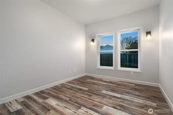 a view of a room that has a window in it