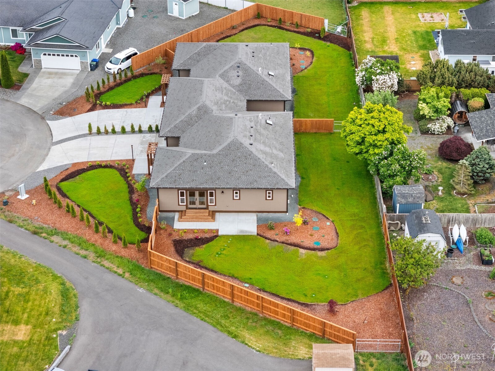 71 Heron Way, Unit A Sequim, WA 98382 - Photo 37 of 38 an aerial view of a house with a swimming pool
