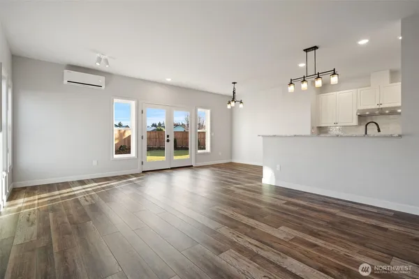 a view of a kitchen with a sink and cabinet