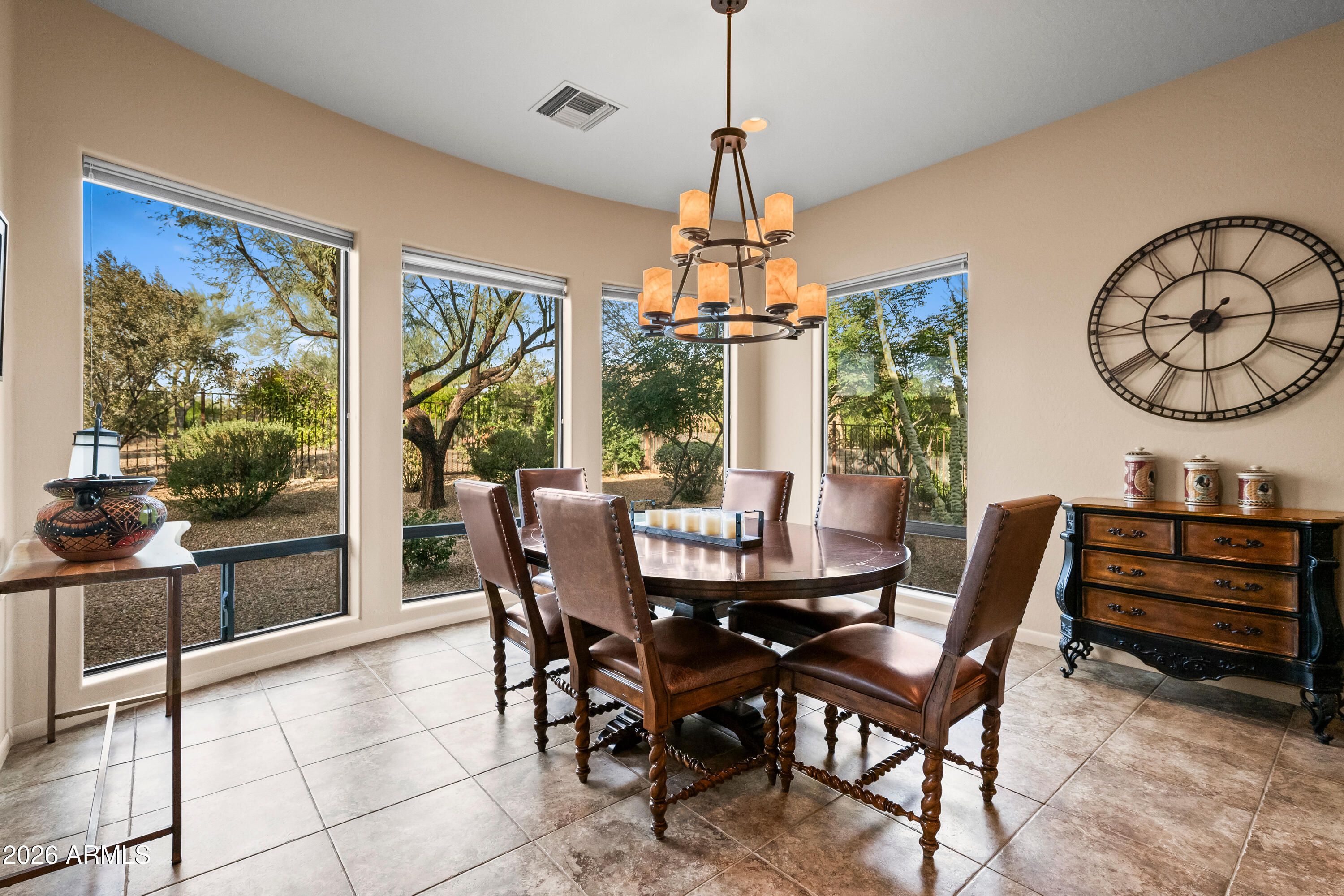 27940 North Walnut Creek Road Rio Verde, AZ 85263 - Photo 15 of 38 a view of a dining room with furniture window and outside view