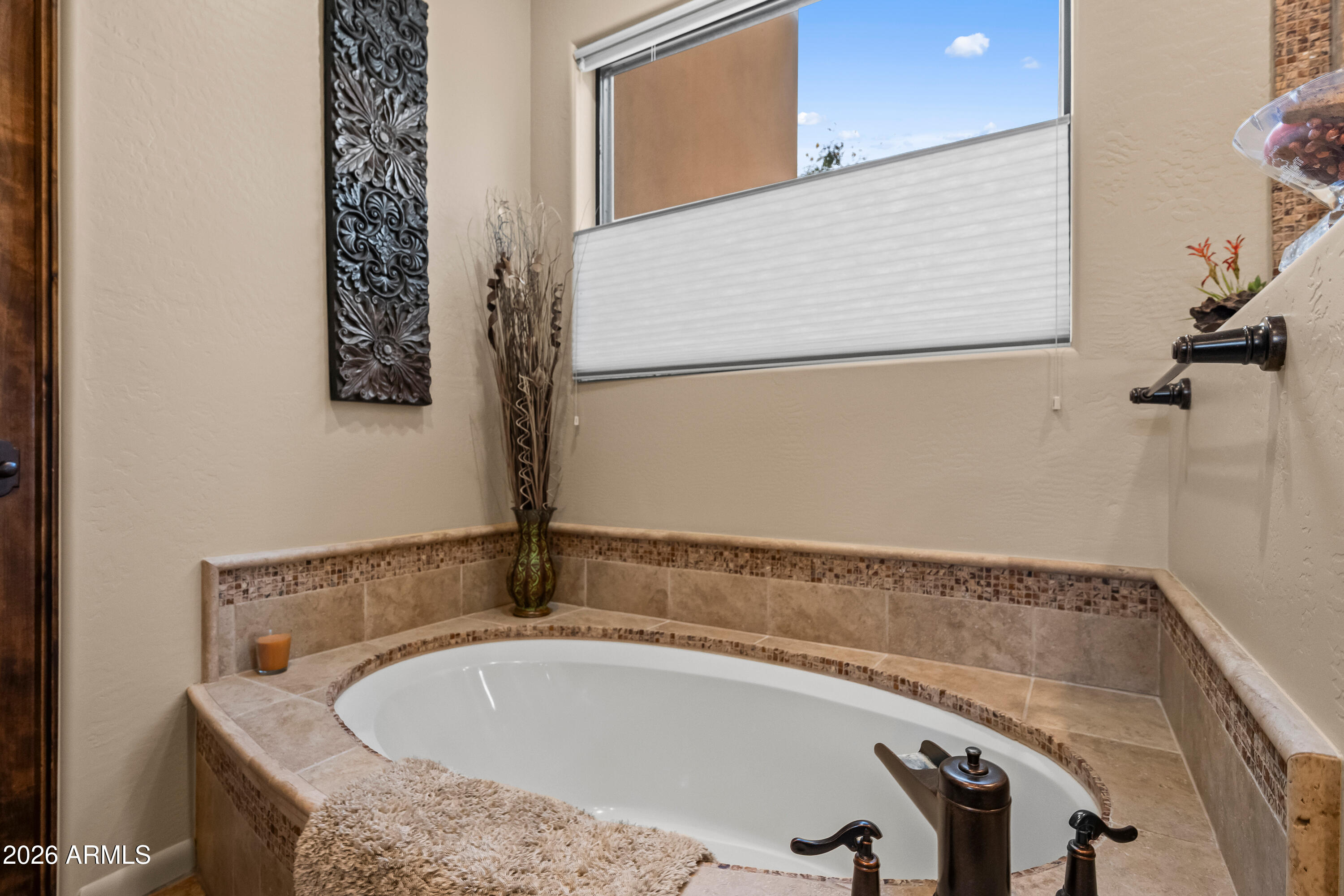 27940 North Walnut Creek Road Rio Verde, AZ 85263 - Photo 20 of 38 a bathroom with a tub and a sink