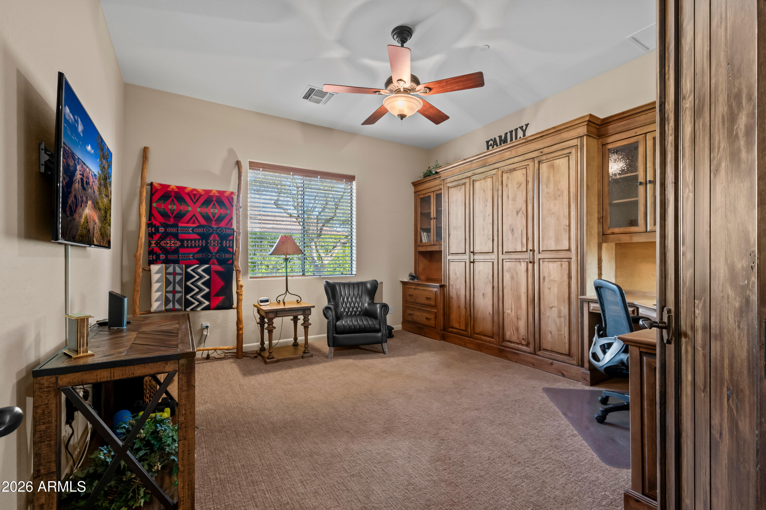 27940 North Walnut Creek Road Rio Verde, AZ 85263 - Photo 28 of 38 a view of a livingroom with furniture and a window