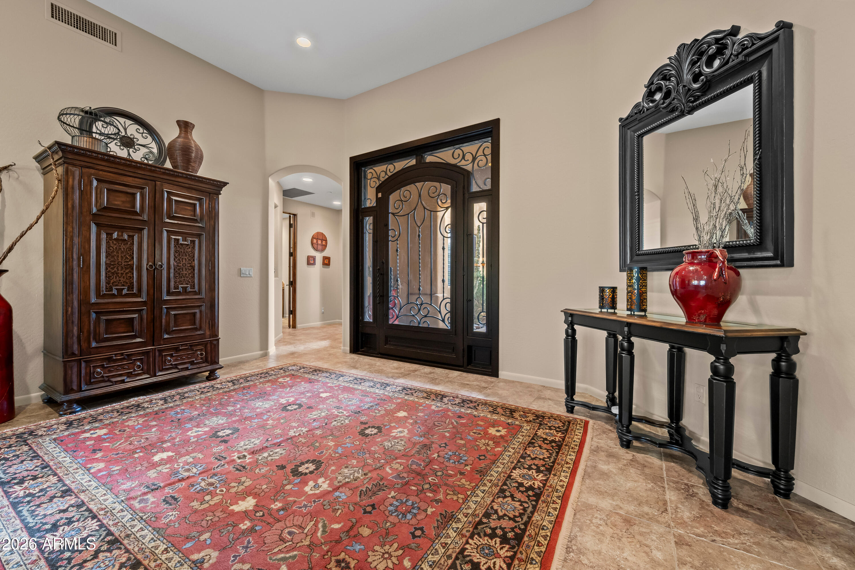 27940 North Walnut Creek Road Rio Verde, AZ 85263 - Photo 5 of 38 a view of a hallway with wooden floor and windows