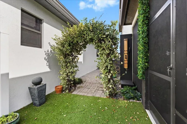 a view of a backyard with plants