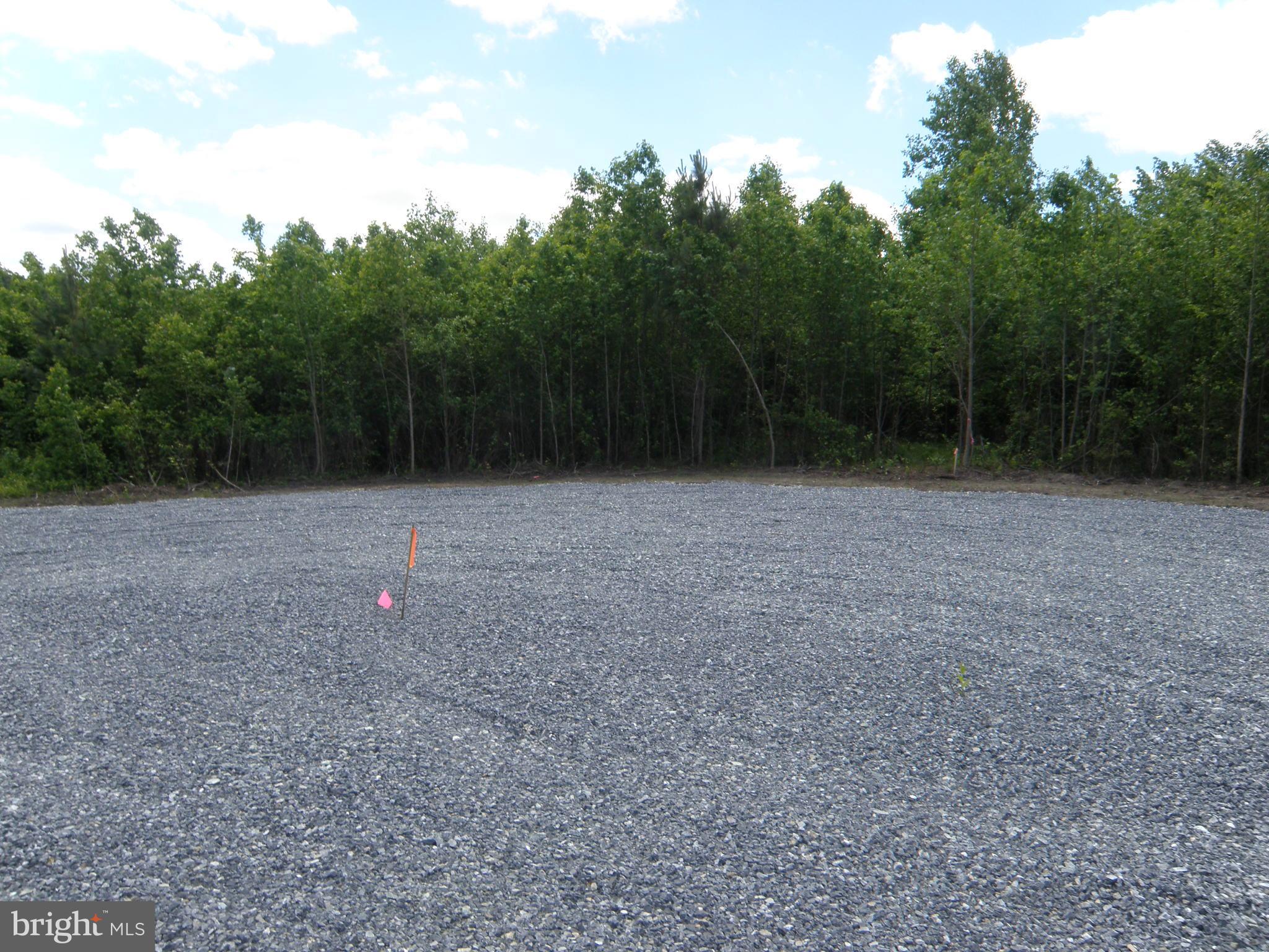 Lot E Lot E 133-9.00-9.16 Road Georgetown, DE 19947 - Photo 2 of 5 a view of a room with a small yard