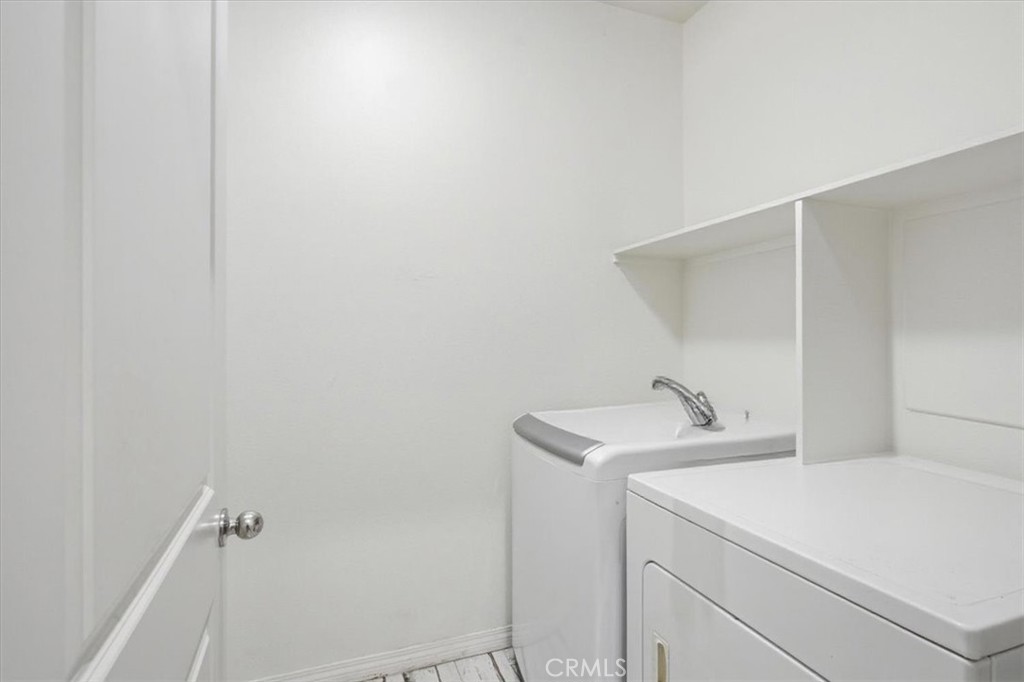 32350 Iron Trail Road Winchester, CA 92596 - Photo 27 of 32 a utility room with dryer and washer