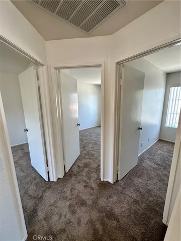 a bathroom with a sink a mirror and a toilet