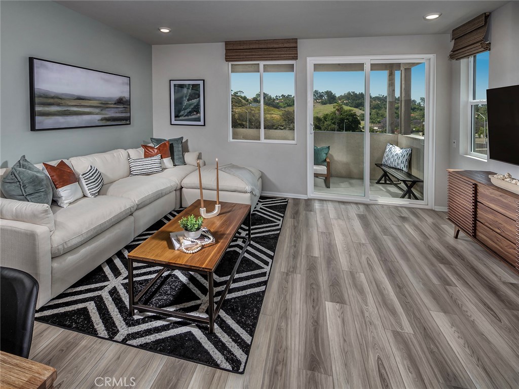 4869 Merida Way Oceanside, CA 92057 - Photo 5 of 13 Photo is not of the actual home, but is an inspirational photo of builder’s model home and may depict options, furnishings, and/or decorator features that are not included
