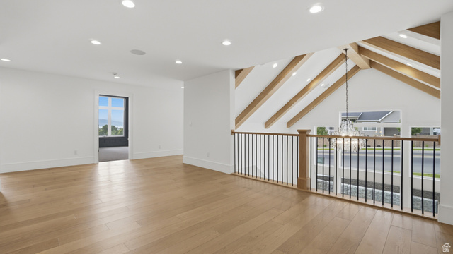 1682 North 1950 W Street, Unit 9 Provo, UT 84604 - Photo 57 of 84 Spacious upper-level area featuring light wood-finish flooring, recessed lighting, and a white color palette