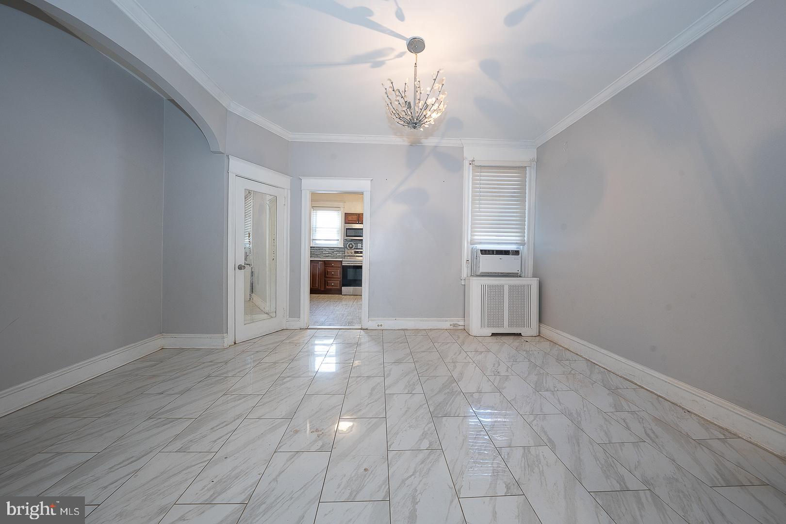 232 Copley Road Upper Darby, PA 19082 - Photo 13 of 47 wooden floor in an empty room with a window