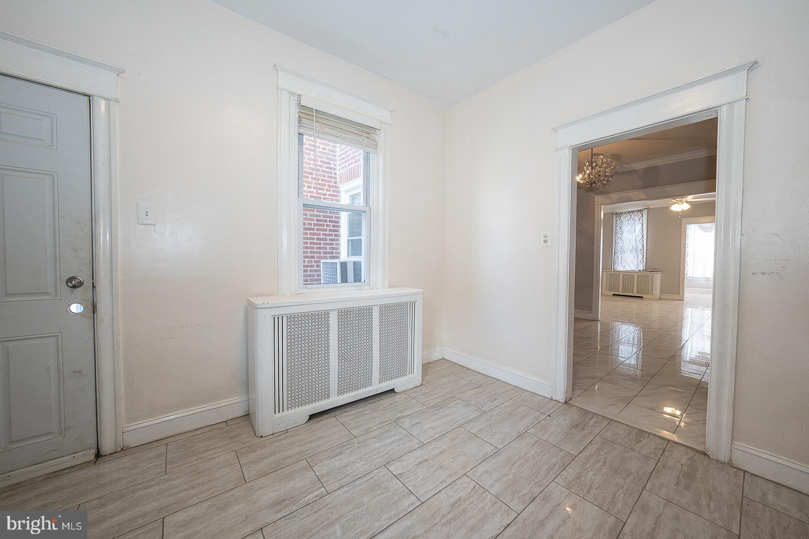 232 Copley Road Upper Darby, PA 19082 - Photo 19 of 47 wooden floor in an empty room and a mirror