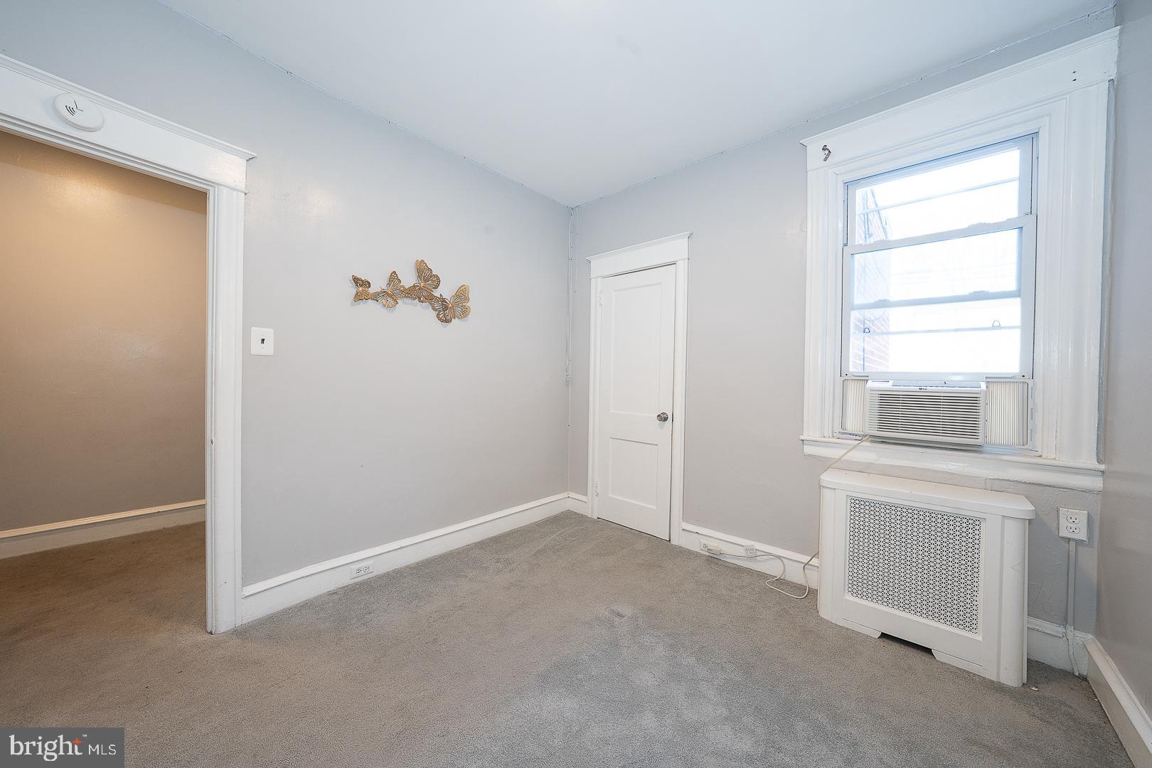 232 Copley Road Upper Darby, PA 19082 - Photo 30 of 47 a view of an empty room with a window