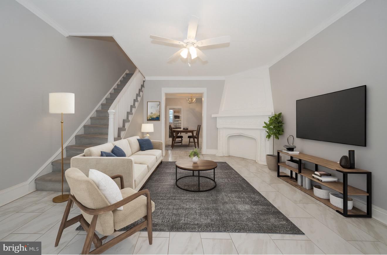 232 Copley Road Upper Darby, PA 19082 - Photo 3 of 47 a living room with furniture and a flat screen tv