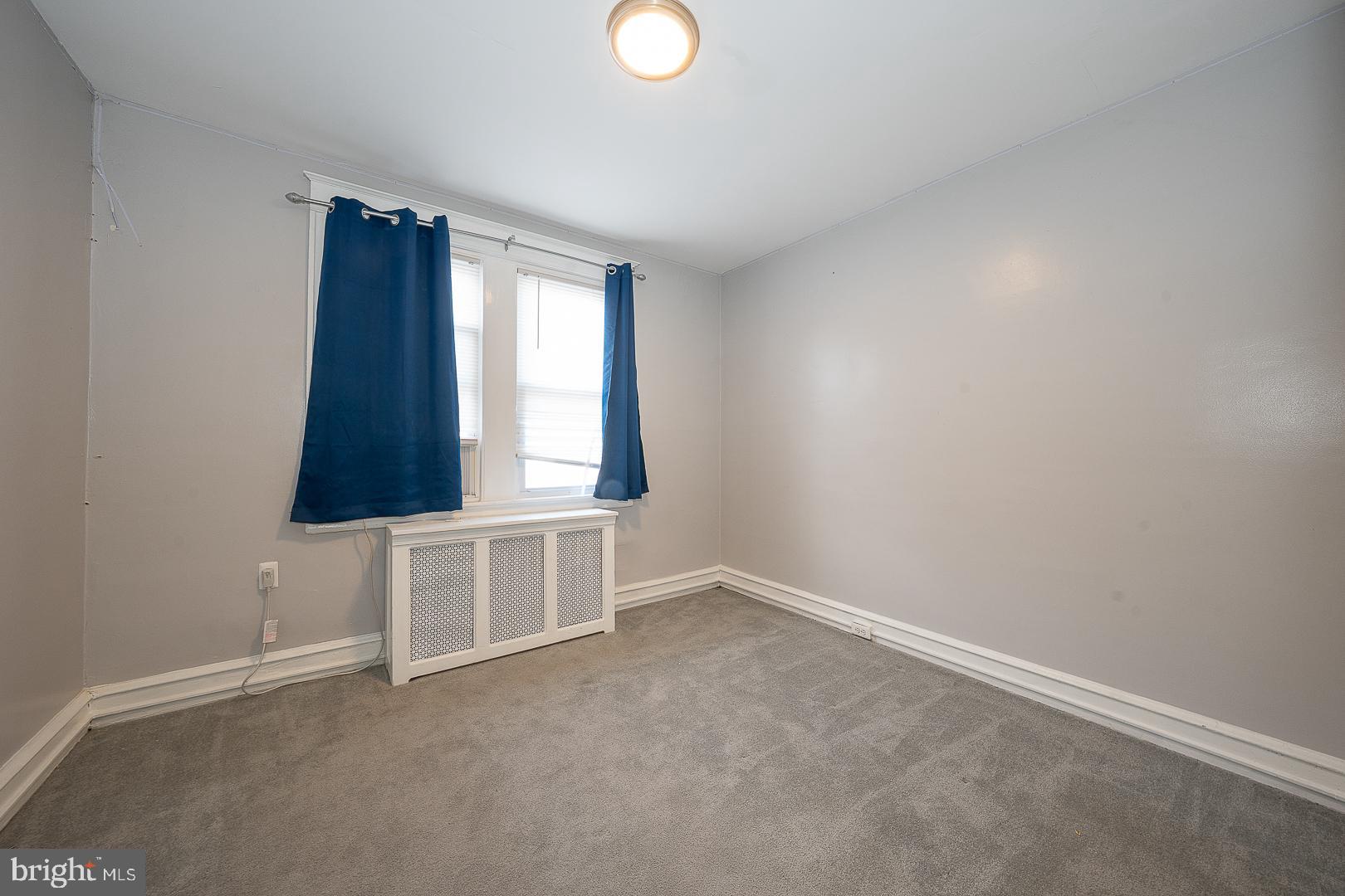 232 Copley Road Upper Darby, PA 19082 - Photo 32 of 47 an empty room with windows