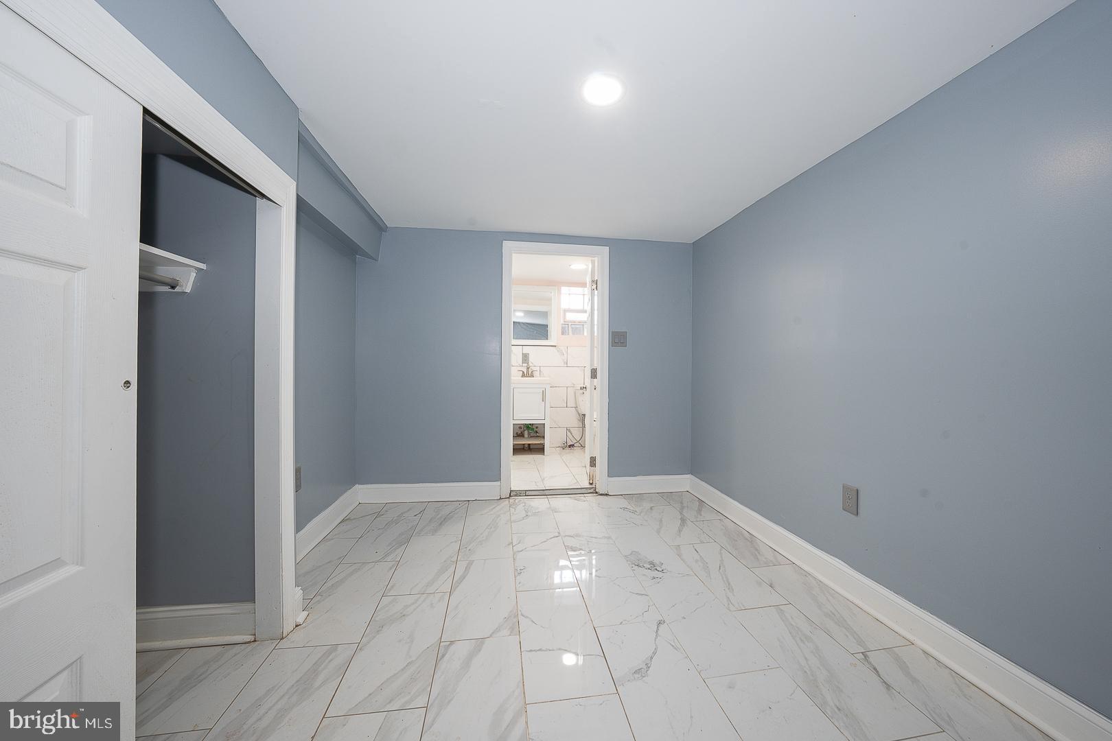 232 Copley Road Upper Darby, PA 19082 - Photo 39 of 47 an empty room with windows and entrance