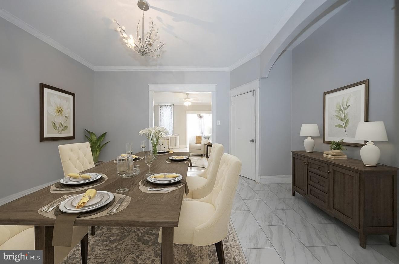 232 Copley Road Upper Darby, PA 19082 - Photo 4 of 47 a view of a dining room with furniture and wooden floor