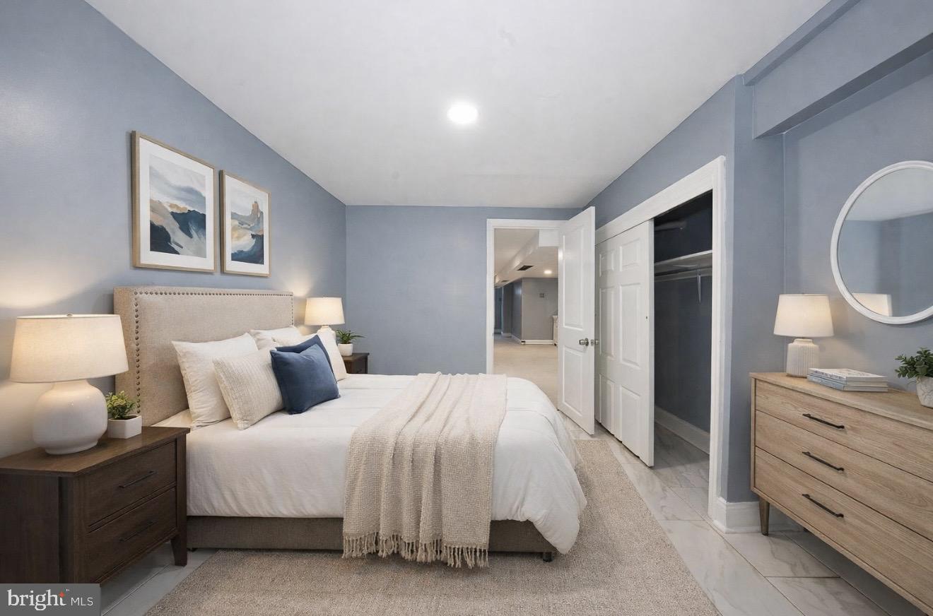 232 Copley Road Upper Darby, PA 19082 - Photo 6 of 47 a bedroom with a bed and a dresser