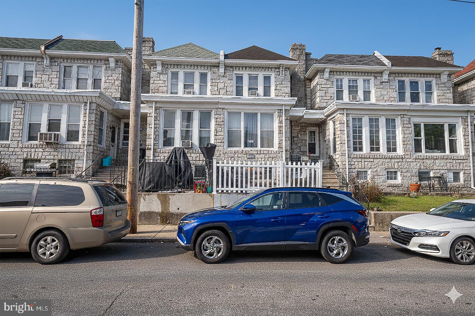 232 Copley Road Upper Darby, PA 19082 - Photo 7 of 47 a car parked in front of a house