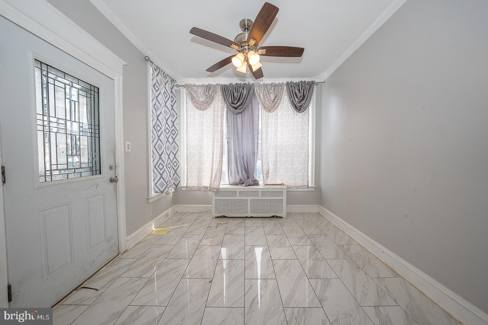 232 Copley Road Upper Darby, PA 19082 - Photo 8 of 47 a view of an empty room and window