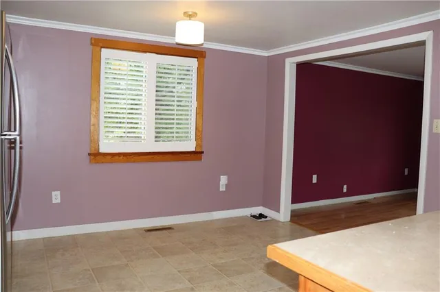 a view of a room with a projector and balcony