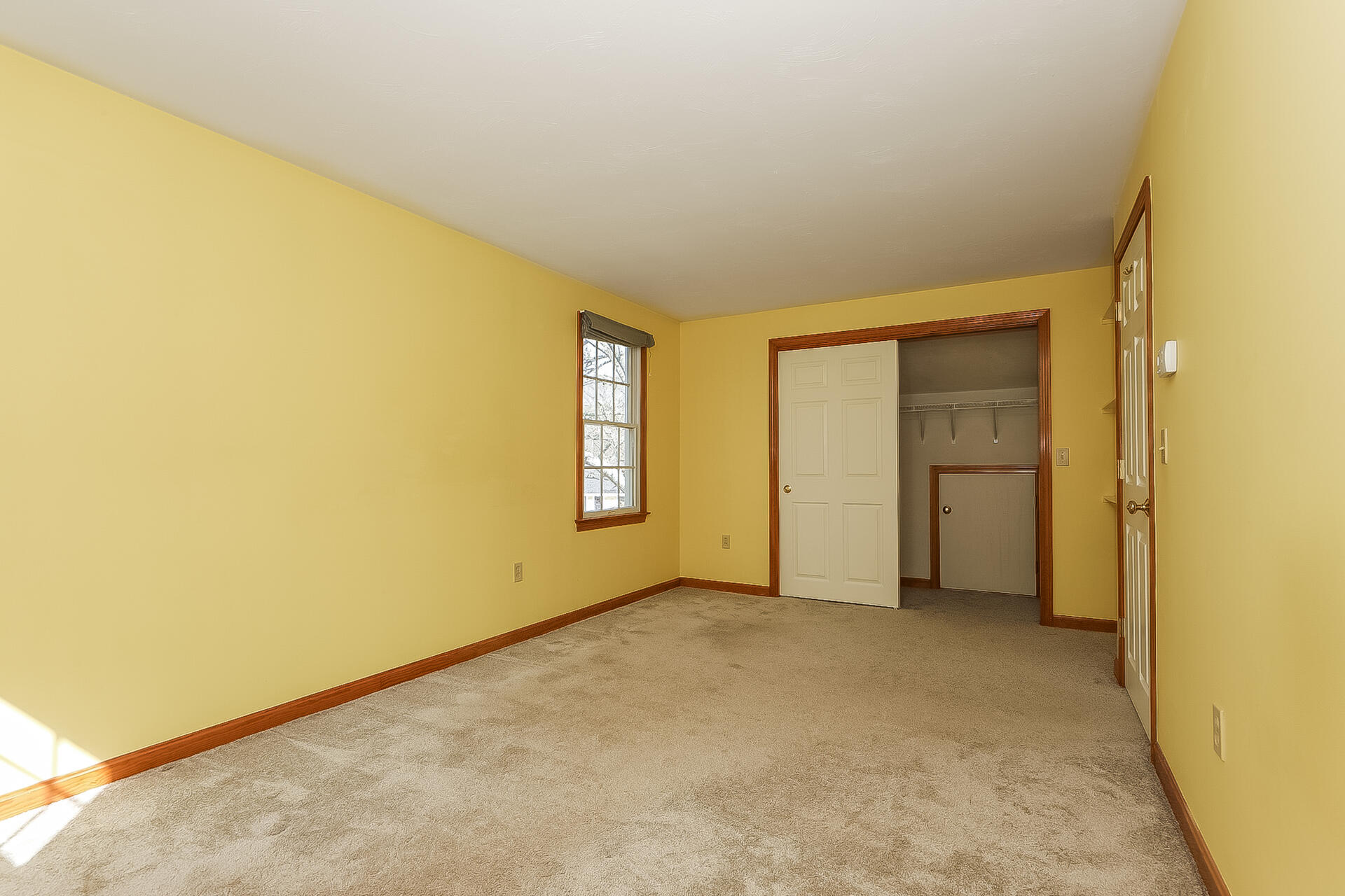 34 Marlboro Road Brewster, MA 02631 - Photo 13 of 23 an empty room with a empty space and windows