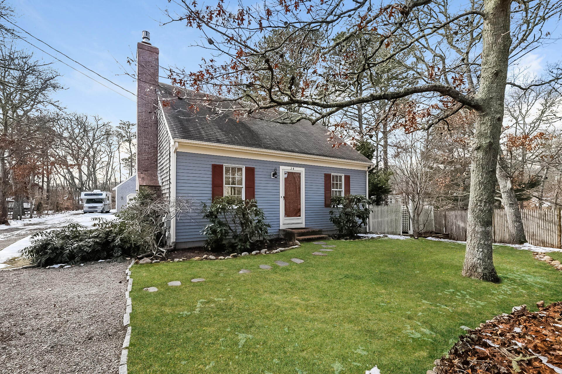 34 Marlboro Road Brewster, MA 02631 - Photo 19 of 23 a brick house with garden in front of it