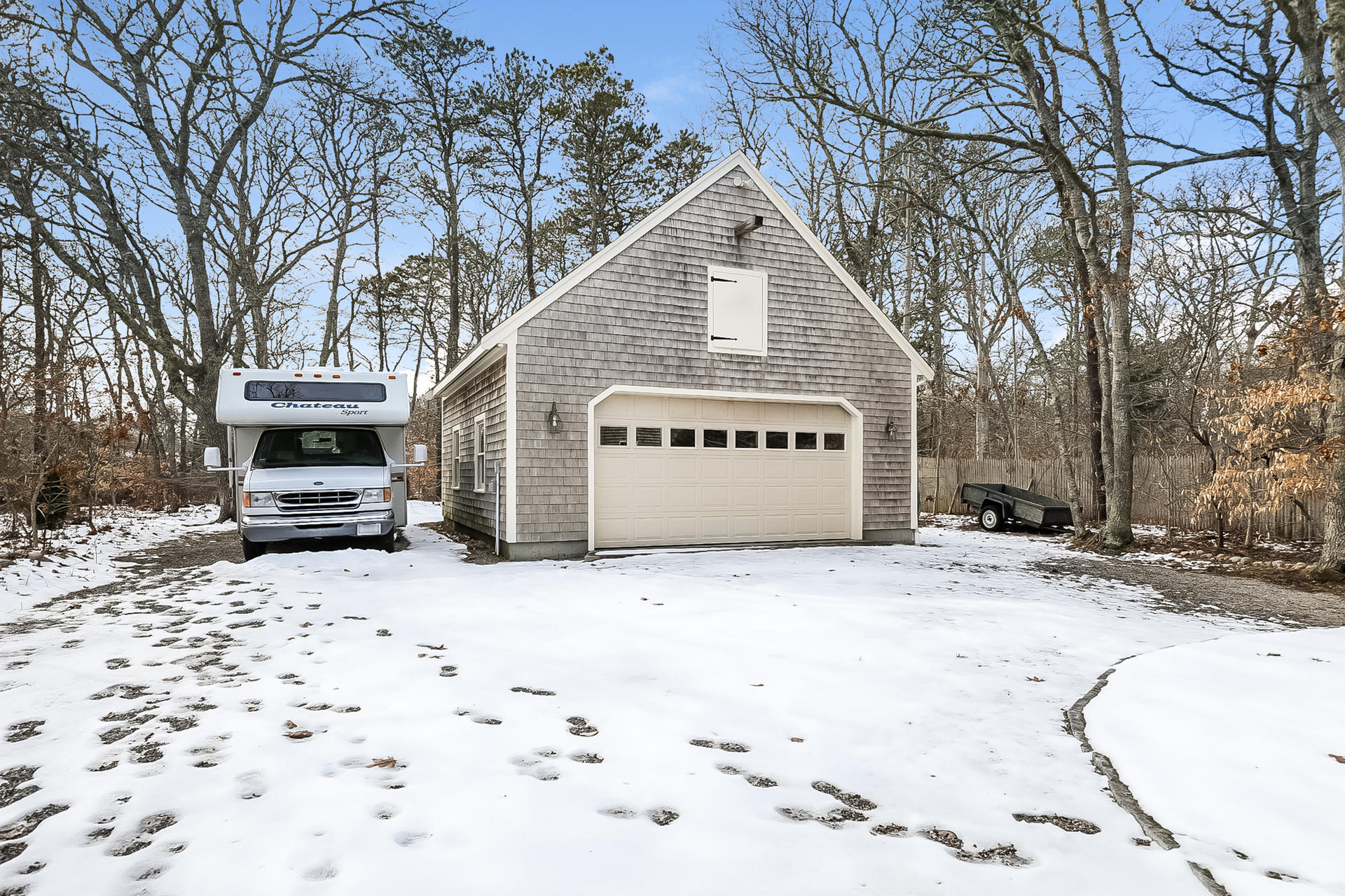 34 Marlboro Road Brewster, MA 02631 - Photo 20 of 23 a view of a parking space in front of house