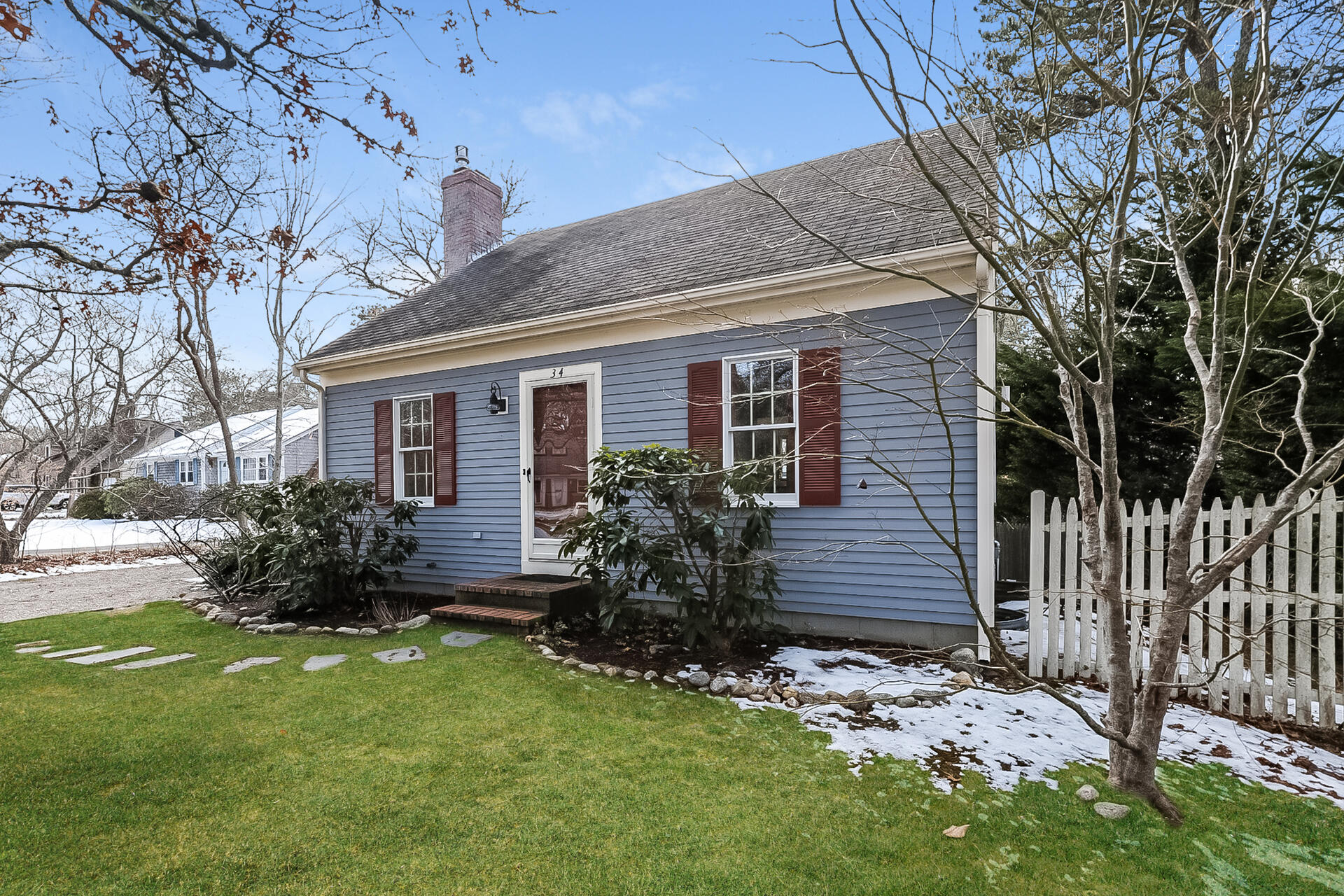 34 Marlboro Road Brewster, MA 02631 - Photo 2 of 23 a house that has a tree in front of the house