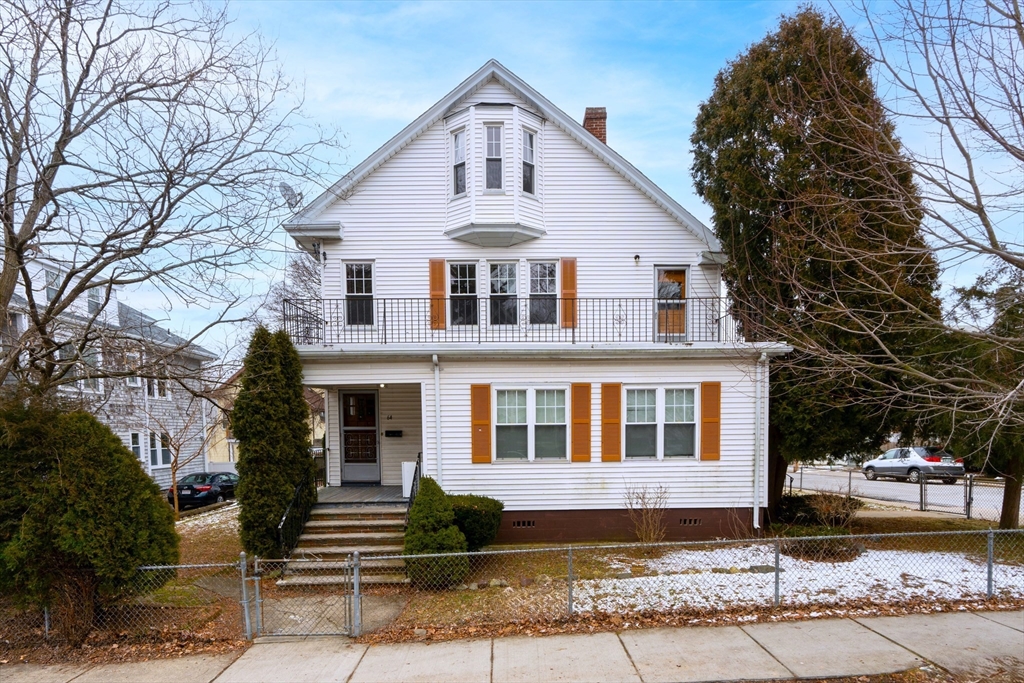 64 Commonwealth Road Watertown, MA 02472 - Photo 1 of 23 a front view of a house with a yard