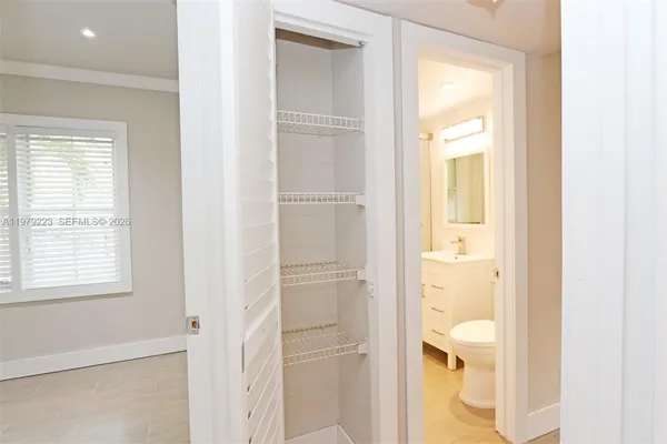 a bathroom with a toilet sink