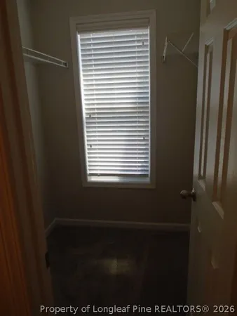 a view of a bathroom with a window