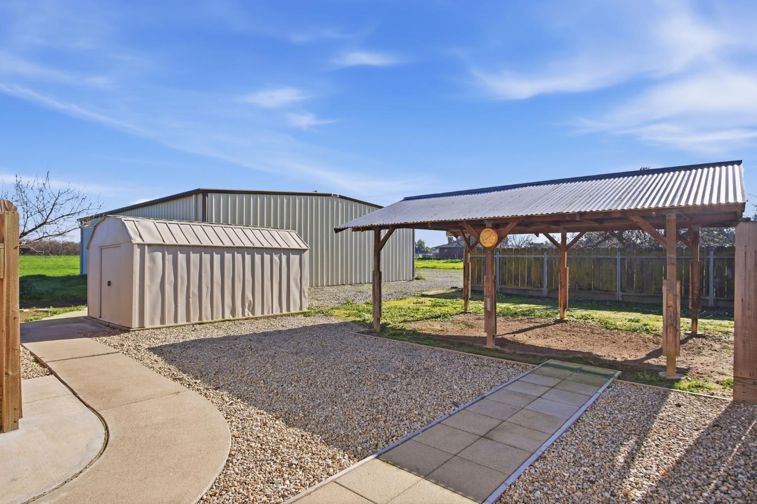16166 Lawrence Road Escalon, CA 95320 - Photo 32 of 56 a view of a backyard