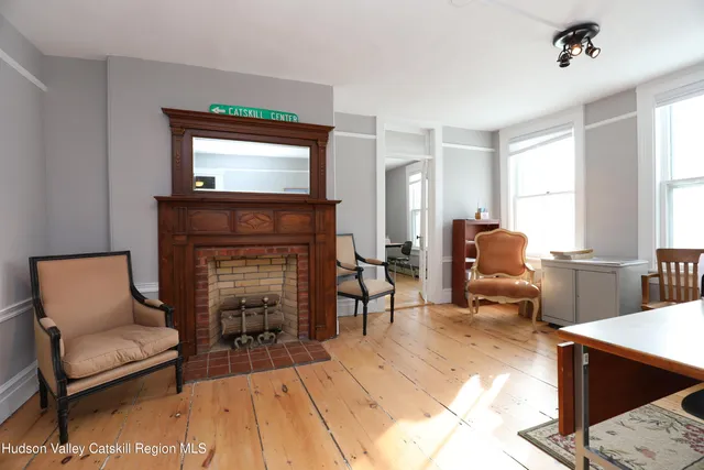 a bed room with furniture and a work place