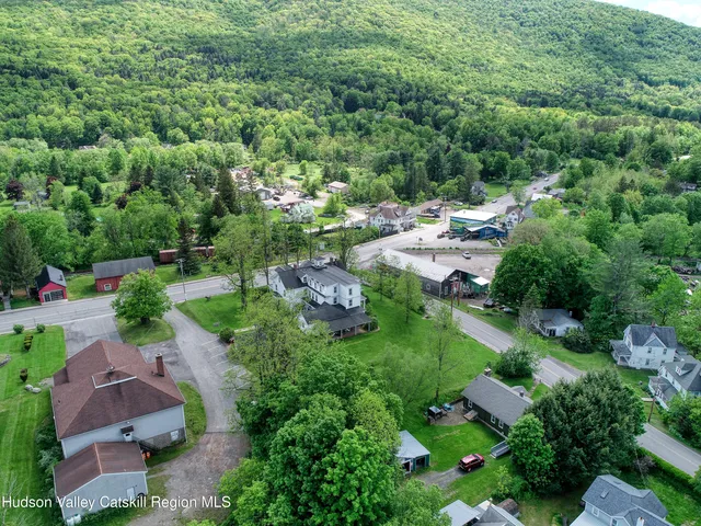 an aerial view of a house with a garden
