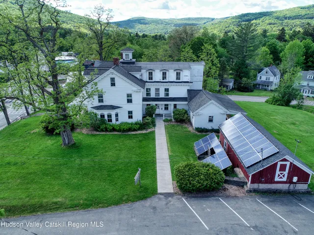 a aerial view of a house with garden