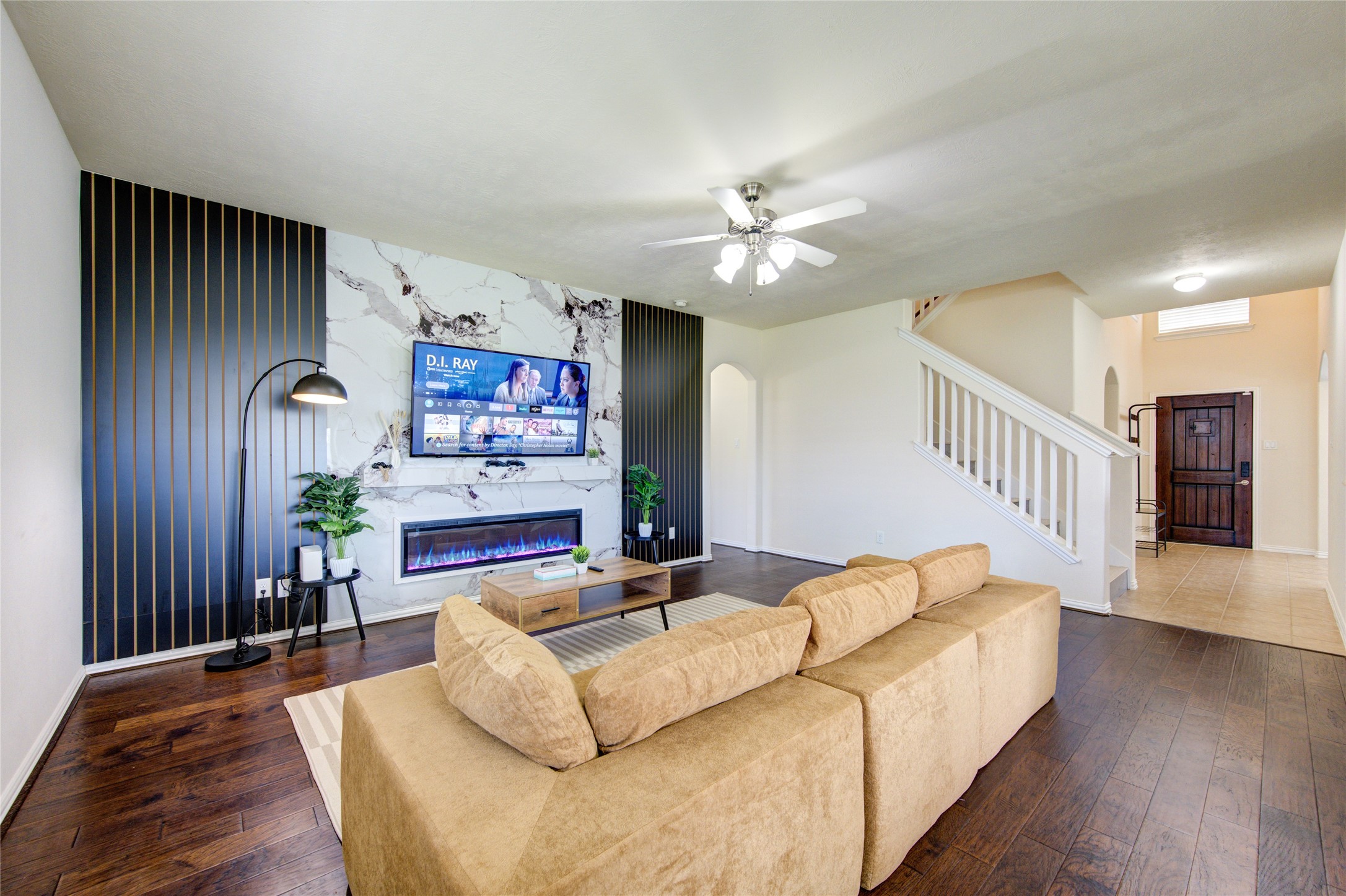 4211 Tristan Ridge Lane Katy, TX 77449 - Photo 12 of 31 a living room with furniture and wooden floor