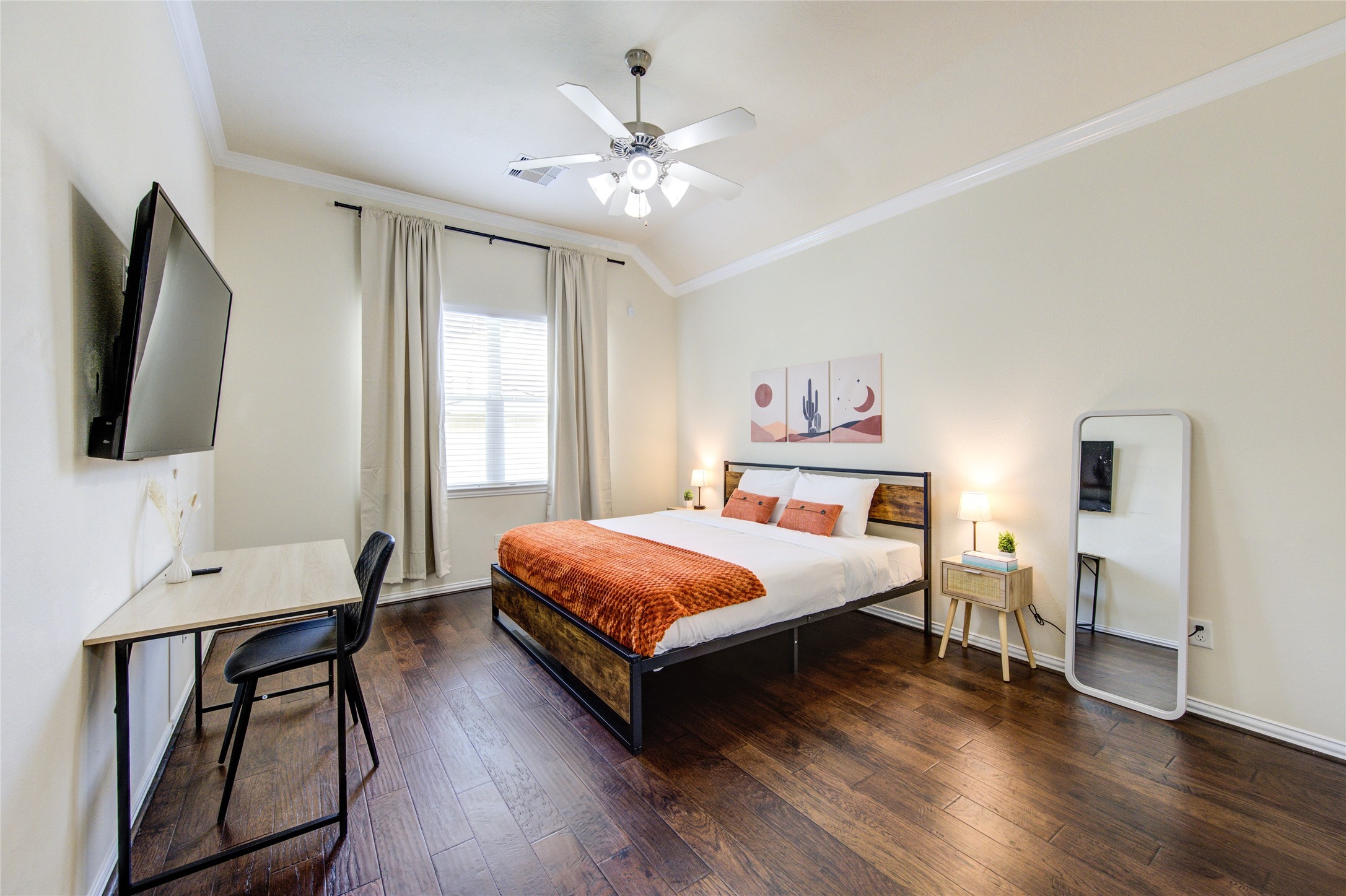 4211 Tristan Ridge Lane Katy, TX 77449 - Photo 16 of 31 a bedroom with a bed and a flat screen tv