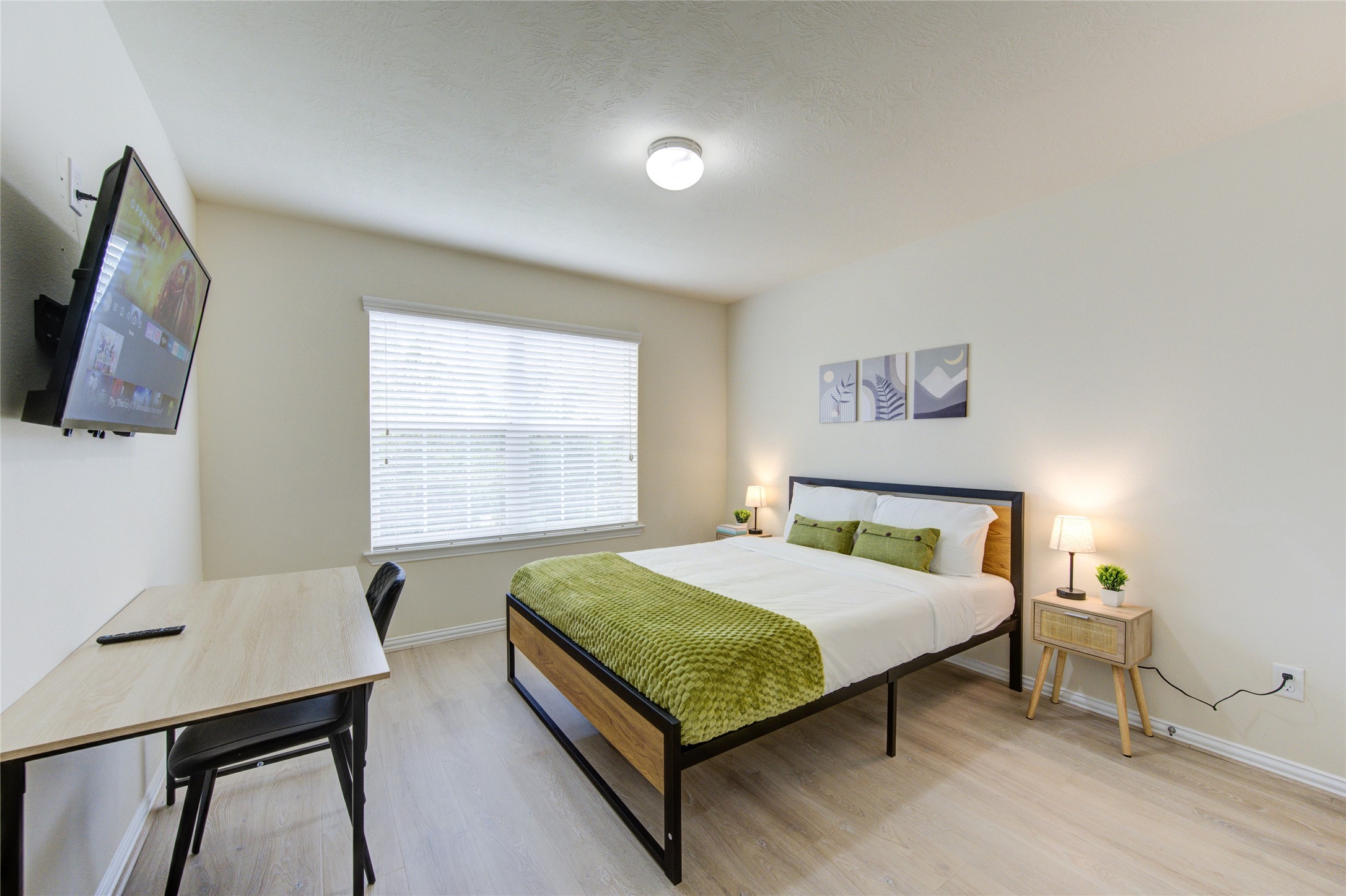 4211 Tristan Ridge Lane Katy, TX 77449 - Photo 23 of 31 a bedroom with a bed and a table in it