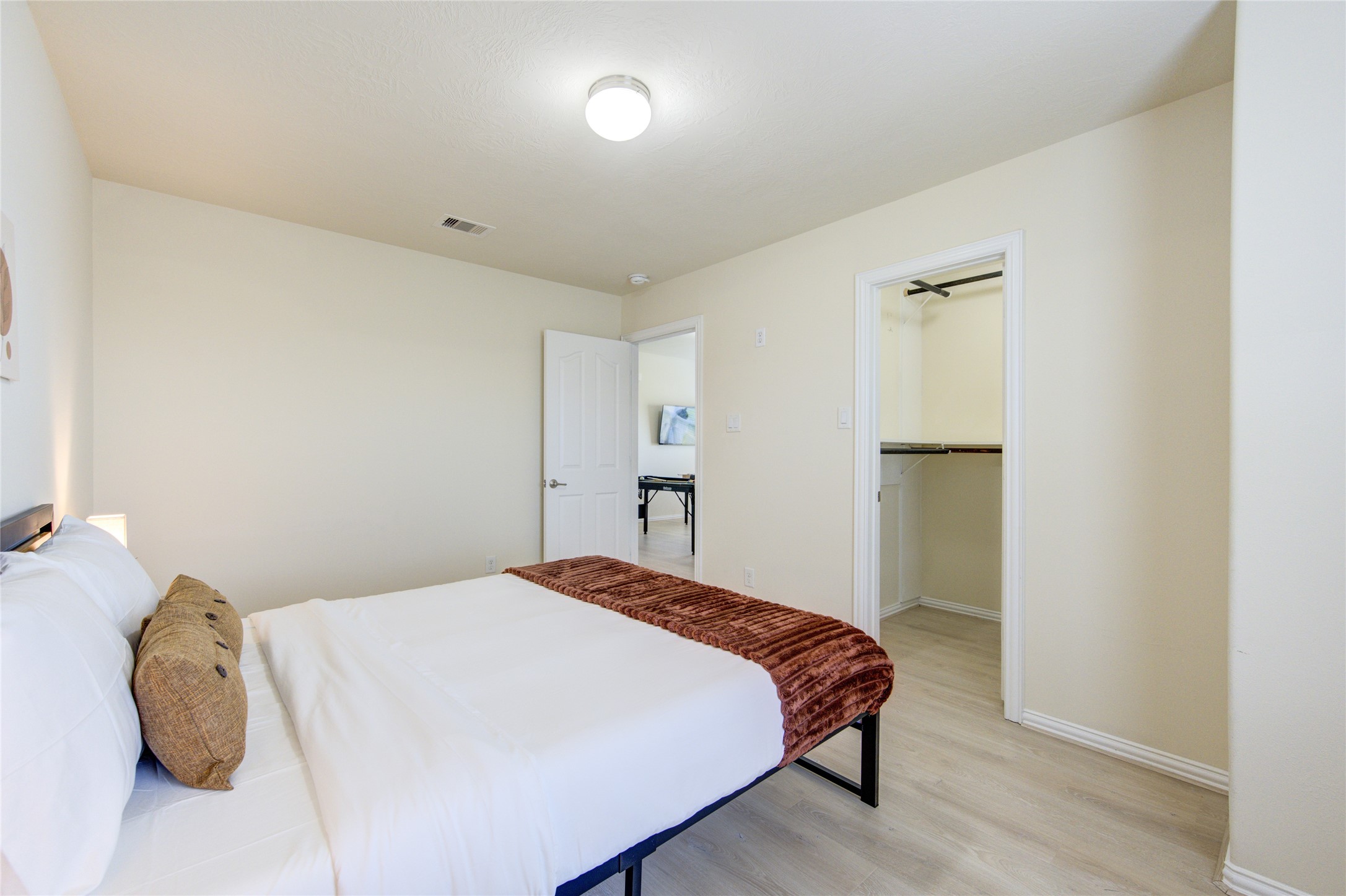 4211 Tristan Ridge Lane Katy, TX 77449 - Photo 26 of 31 a bedroom with a bed and a closet