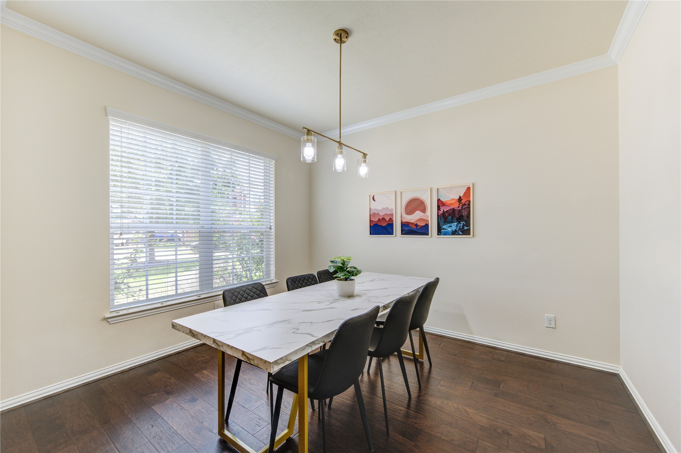 4211 Tristan Ridge Lane Katy, TX 77449 - Photo 5 of 31 a view of a dining room with furniture wooden floor and chandelier